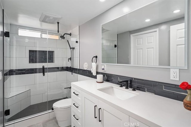 25009 Wintergreen Ct, Stevenson Ranch, CA 91381 - full bathroom with vanity, toilet, a stall shower, and recessed lighting