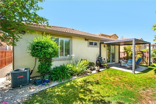 543 Garden Ave, Pomona, CA 91767 - rear view of property with stucco siding and a patio area