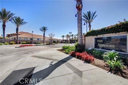 543 Garden Ave, Pomona, CA 91767 - view of concrete road featuring street lights