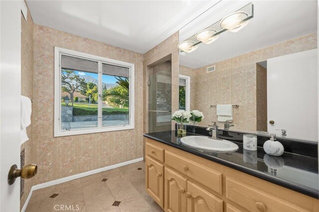 738 Hampton Rd, Arcadia, CA 91006 - bathroom with wallpapered walls and vanity