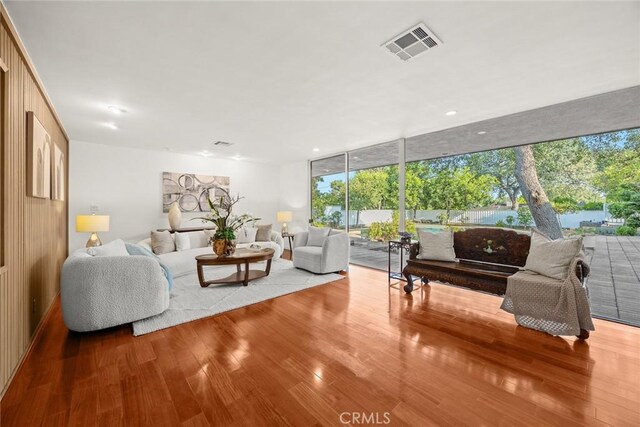 738 Hampton Rd, Arcadia, CA 91006 - living area featuring wood finished floors, expansive windows, and recessed lighting