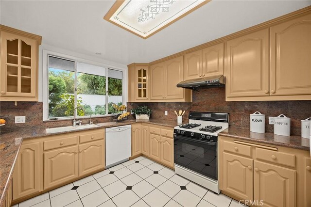 738 Hampton Rd, Arcadia, CA 91006 - kitchen featuring dishwasher, gas stove, under cabinet range hood, glass insert cabinets, and decorative backsplash