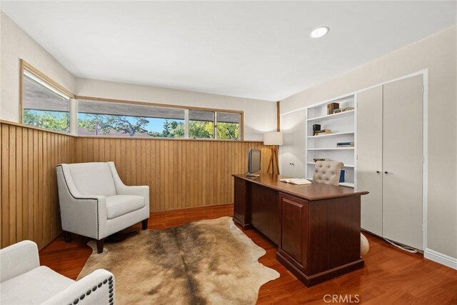 738 Hampton Rd, Arcadia, CA 91006 - office featuring healthy amount of natural light, wood finished floors, and a wainscoted wall