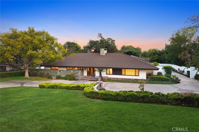738 Hampton Rd, Arcadia, CA 91006 - view of front of home featuring a chimney, a front lawn, and a tile roof