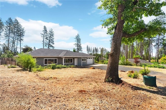 5972 Peck Ln, Paradise, CA 95969 - ranch-style home featuring a garage and concrete driveway