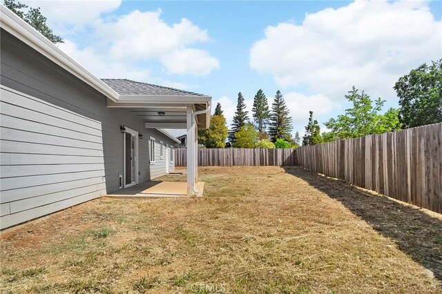 5972 Peck Ln, Paradise, CA 95969 - fenced backyard with a patio area