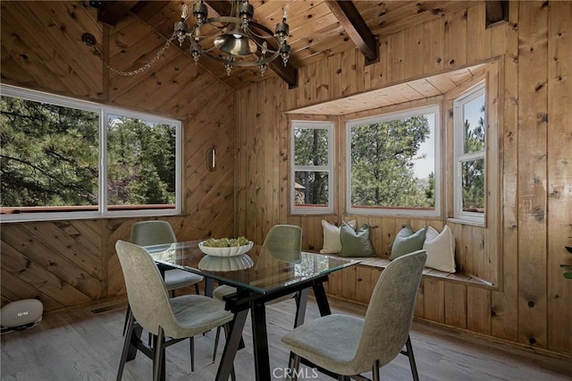 27947 St Bernard Ln, Lake Arrowhead, CA 92352 - dining room featuring a chandelier, wood walls, wood ceiling, and wood finished floors