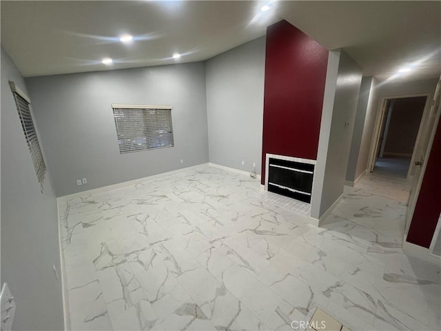21212 Camelia Unit 46, Lake Forest, CA 92630 - spare room featuring marble finish flooring, baseboards, and recessed lighting