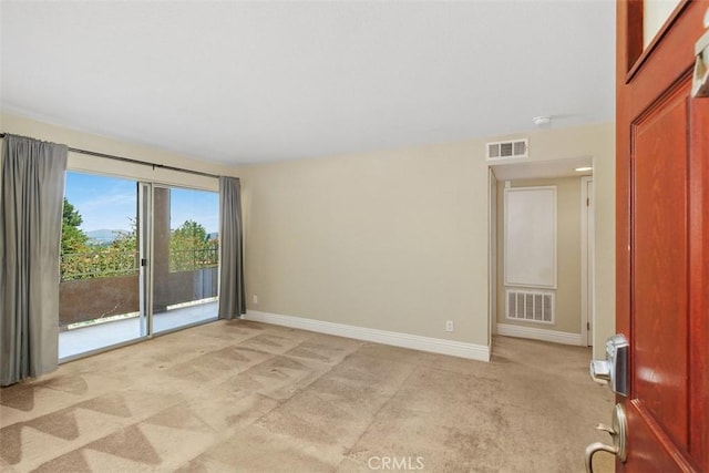2400 San Gabriel Way Unit 205, Corona, CA 92882 - spare room with light colored carpet and baseboards