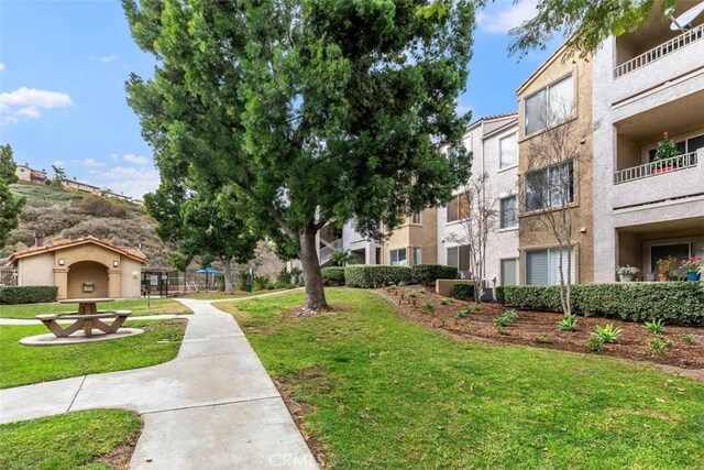 2400 San Gabriel Way Unit 205, Corona, CA 92882 - surrounding community featuring a lawn
