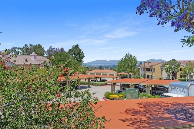 2400 San Gabriel Way Unit 205, Corona, CA 92882 - surrounding community with a mountain view and covered parking