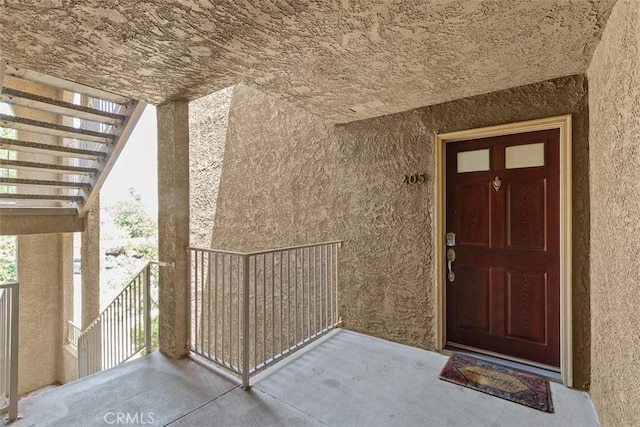 2400 San Gabriel Way Unit 205, Corona, CA 92882 - entrance to property featuring stucco siding and a balcony