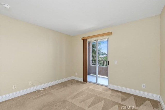 2400 San Gabriel Way Unit 205, Corona, CA 92882 - unfurnished room featuring baseboards, carpet, and a smoke detector