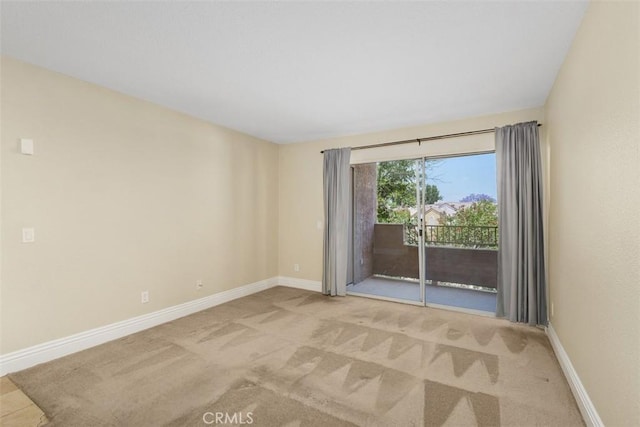 2400 San Gabriel Way Unit 205, Corona, CA 92882 - carpeted spare room featuring baseboards