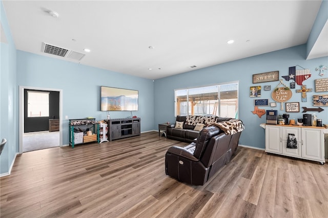 1372 Bello Pl, San Jacinto, CA 92582 - living area with light wood finished floors, recessed lighting, and baseboards