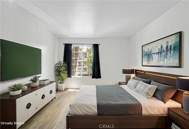 5500 Owensmouth Ave Unit 218, Woodland Hills, CA 91367 - bedroom with light wood-type flooring