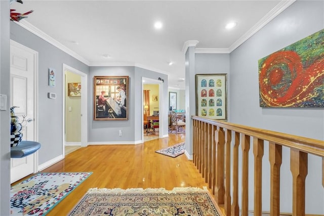 6309 Via Colinita, Rancho Palos Verdes, CA 90275 - corridor with wood finished floors, crown molding, recessed lighting, baseboards, and an upstairs landing