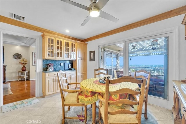 6309 Via Colinita, Rancho Palos Verdes, CA 90275 - dining space featuring crown molding, light tile patterned flooring, ceiling fan, and recessed lighting