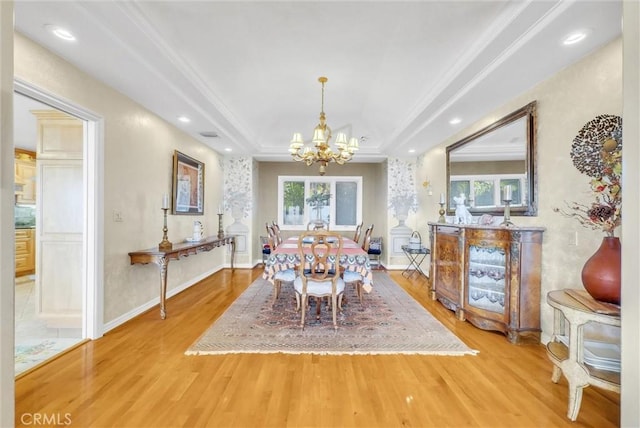 6309 Via Colinita, Rancho Palos Verdes, CA 90275 - dining space with a chandelier, wood finished floors, crown molding, a tray ceiling, and recessed lighting