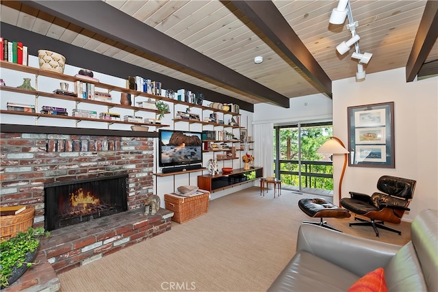 27280 Peninsula Dr, Lake Arrowhead, CA 92352 - living area featuring carpet flooring, a brick fireplace, wooden ceiling with exposed beams, and rail lighting