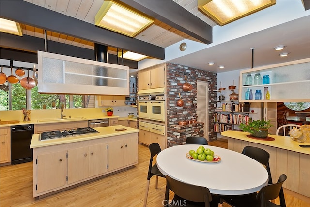 27280 Peninsula Dr, Lake Arrowhead, CA 92352 - kitchen with a sink, gas cooktop, oven, stainless steel dishwasher, and light countertops