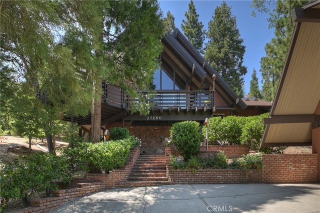 27280 Peninsula Dr, Lake Arrowhead, CA 92352 - back of house with stairway and a wooden deck
