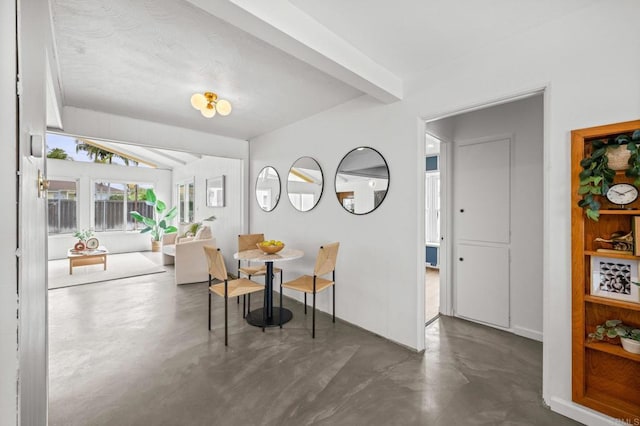 1918 S Freeman St, Oceanside, CA 92054 - dining room featuring finished concrete floors and beam ceiling
