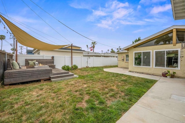 1918 S Freeman St, Oceanside, CA 92054 - fenced backyard with a deck, a patio, and an outdoor living space