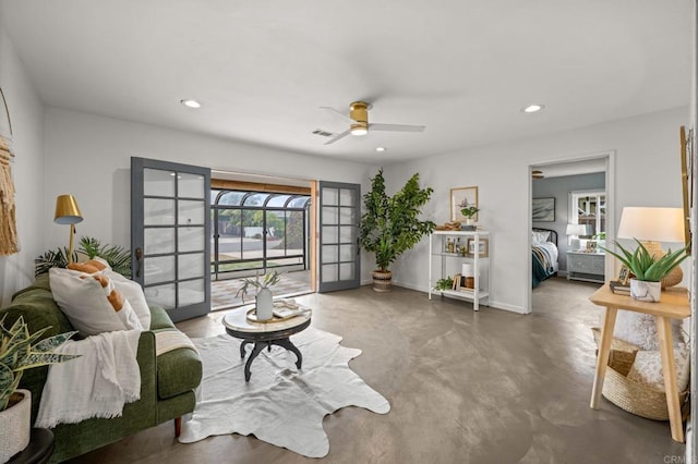 1918 S Freeman St, Oceanside, CA 92054 - living room featuring ceiling fan, recessed lighting, and concrete flooring
