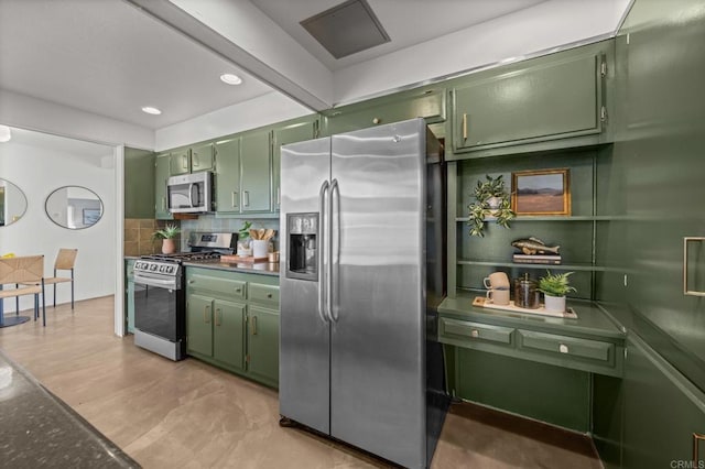 1918 S Freeman St, Oceanside, CA 92054 - kitchen with appliances with stainless steel finishes, green cabinets, and backsplash
