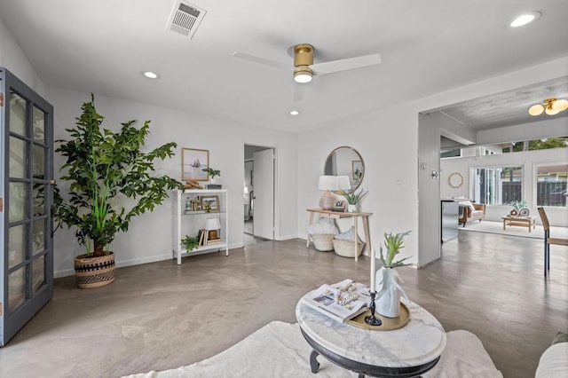 1918 S Freeman St, Oceanside, CA 92054 - living area featuring finished concrete flooring, ceiling fan, and recessed lighting