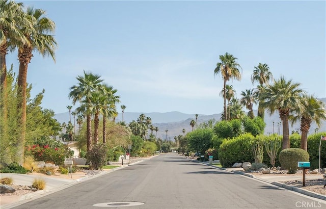 45740 Verba Santa Dr, Palm Desert, CA 92260 - view of asphalt street with a mountain view and curbs