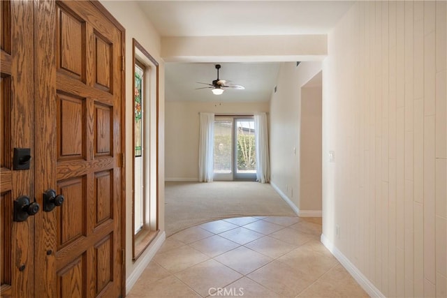 45740 Verba Santa Dr, Palm Desert, CA 92260 - foyer featuring light colored carpet, a ceiling fan, and light tile patterned flooring