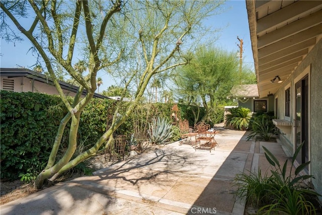 45740 Verba Santa Dr, Palm Desert, CA 92260 - fenced backyard featuring a patio area