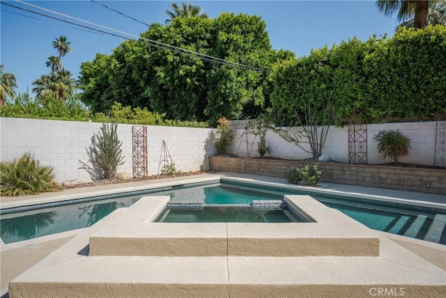 45740 Verba Santa Dr, Palm Desert, CA 92260 - view of pool featuring a pool with connected hot tub and a fenced backyard