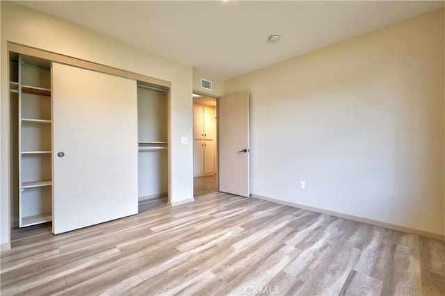 4163 Alma Ct, Chino, CA 91710 - unfurnished bedroom featuring light wood-type flooring and a closet