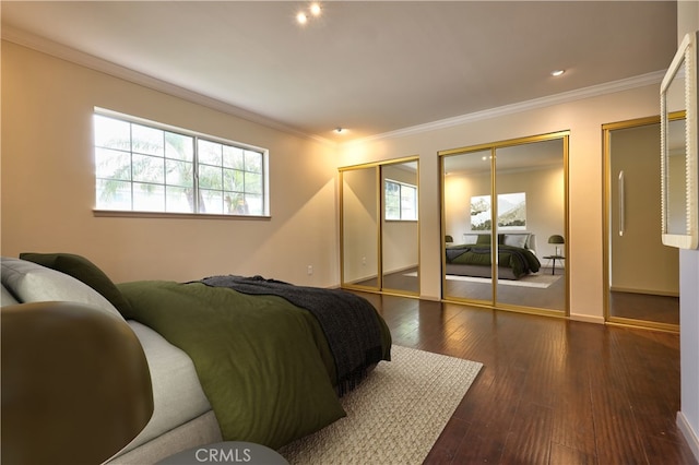 4163 Alma Ct, Chino, CA 91710 - bedroom with two closets, dark wood-type flooring, crown molding, and recessed lighting