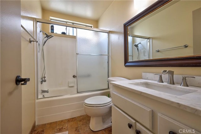 4163 Alma Ct, Chino, CA 91710 - full bath with vanity, combined bath / shower with glass door, and stone finish floors