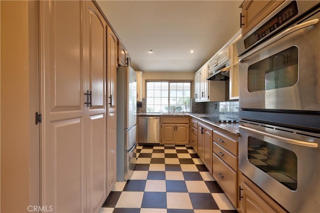 4163 Alma Ct, Chino, CA 91710 - kitchen with stainless steel appliances, tile patterned floors, backsplash, recessed lighting, and stone counters