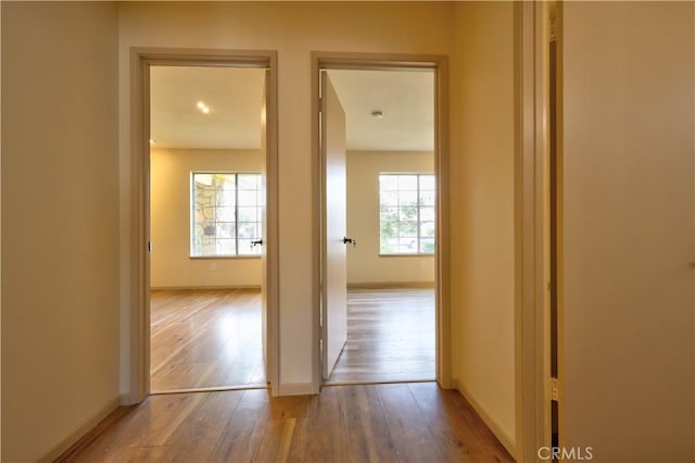 4163 Alma Ct, Chino, CA 91710 - hall with wood finished floors and plenty of natural light