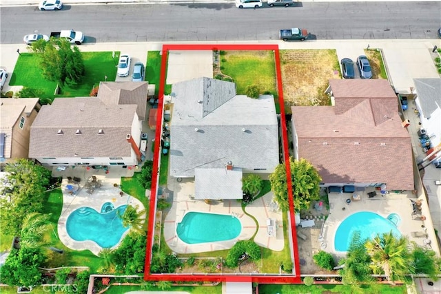 4163 Alma Ct, Chino, CA 91710 - aerial perspective of suburban area featuring property parcel outlined