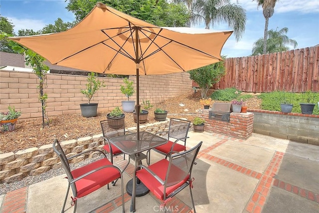 22784 Wren St, Grand Terrace, CA 92313 - fenced backyard featuring outdoor dining space and a patio area