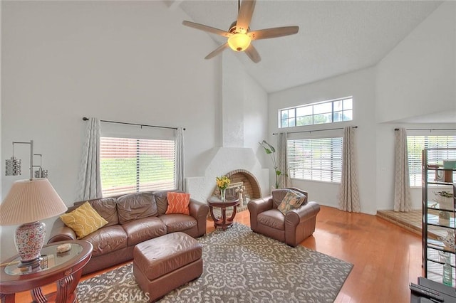 22784 Wren St, Grand Terrace, CA 92313 - living area with high vaulted ceiling, healthy amount of natural light, wood finished floors, and ceiling fan