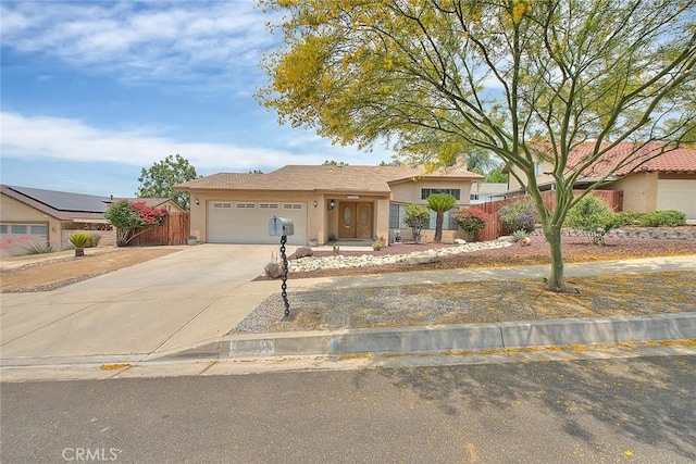 22784 Wren St, Grand Terrace, CA 92313 - ranch-style home featuring an attached garage, concrete driveway, and stucco siding