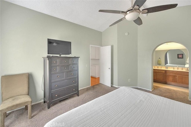 22784 Wren St, Grand Terrace, CA 92313 - bedroom with carpet flooring, arched walkways, baseboards, high vaulted ceiling, and a textured ceiling