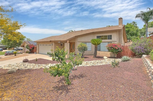 22784 Wren St, Grand Terrace, CA 92313 - single story home featuring stucco siding, driveway, a garage, and a chimney
