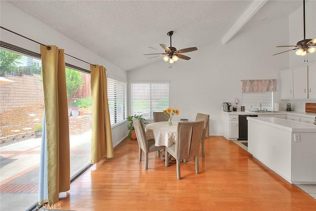 22784 Wren St, Grand Terrace, CA 92313 - dining area featuring a ceiling fan, lofted ceiling, a textured ceiling, and light wood-style flooring