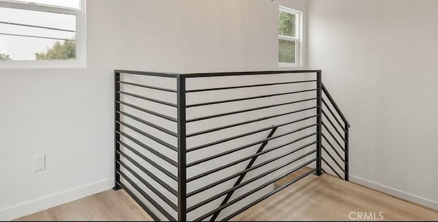 1209 W 40th Pl, Los Angeles, CA 90037 - stairway featuring baseboards and wood finished floors
