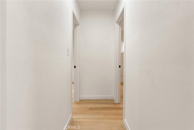 1209 W 40th Pl, Los Angeles, CA 90037 - hall with light wood-style flooring and baseboards