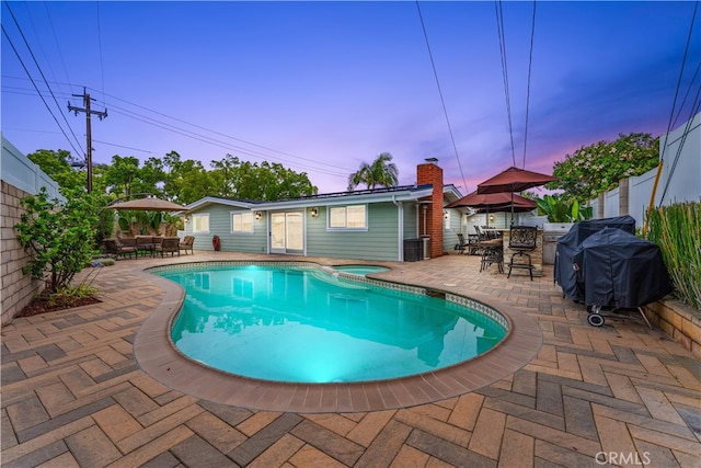 249 Loyola Rd, Costa Mesa, CA 92626 - view of swimming pool featuring outdoor dining area, a patio area, and a fenced backyard